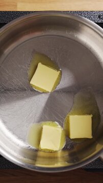 Butter pieces melt in saucepan for garlic butter. Garlic butter blends garlic, parsley, salt and pepper. Brush garlic butter on warm baguette, crispy toast, pasta, potatoes, shrimp or vegetables.