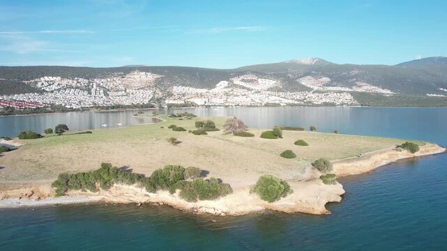 Aerial Drone View of Sapli Ada Tidal Island Surrounded by Turquoise Aegean Sea Akbuk Didim Turkey