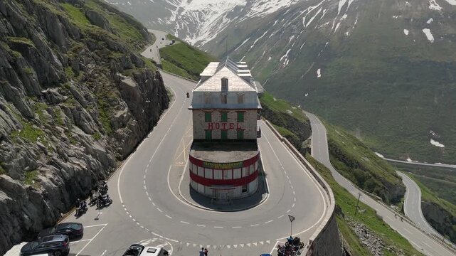 Hotel Belvedere on FurkaPass, Uri Canton, Switzerland. Abandoned hotel on the Furka mountain Pass at Sunny day, Aerial