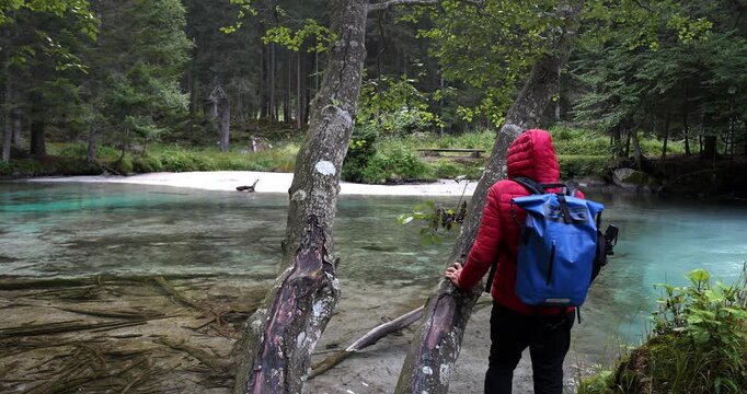 Boy admires the beauty of the Amola lakes.