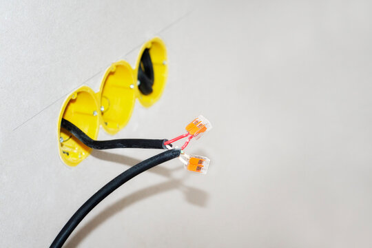 Electrical wiring installation in clean drywall with copy space
