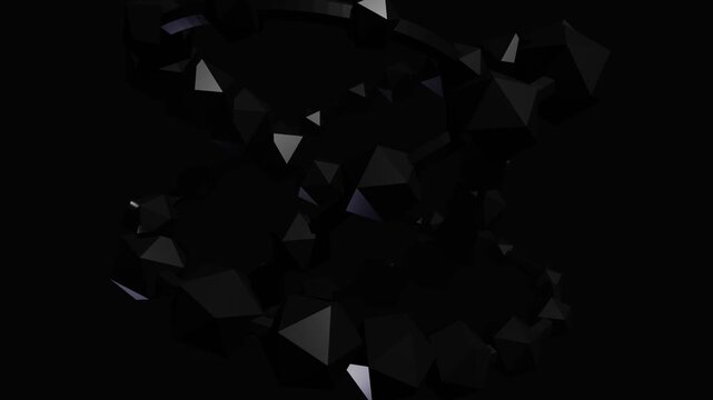 Abstract black low poly geometric shards rotating in dark cinematic background