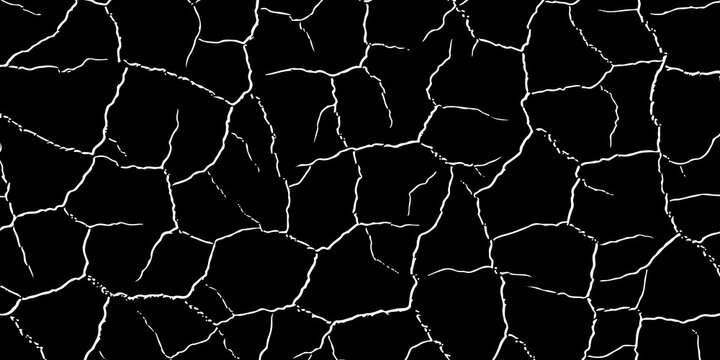 Black cracked surface with large white fissures for dramatic grunge texture backgrounds