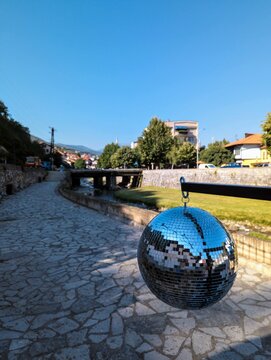 a disco ball in the city