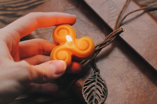 triskelle yellow triquetra candle from beeswax