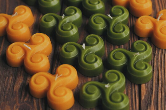 triskelle triquetra yellow and green candles from beeswax