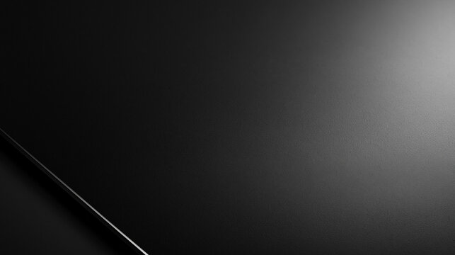Sleek Black Matte Surface Background with Gradient Light