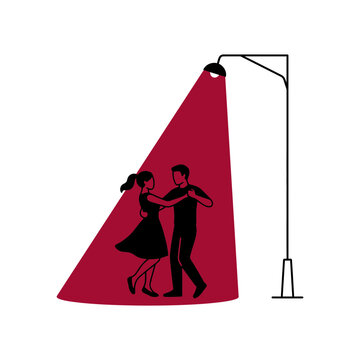Couple dancing under streetlamp light in a romantic night scene