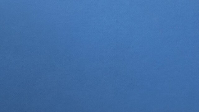 White paper tearing open to reveal blue background in stop motion. Concept of product launches, breaking news, surprise announcements and advertising reveal effects.