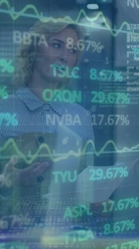 Animation of trading board, binary codes, computer language on diverse coworkers discussing reports