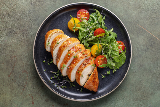 Green salad with chicken fillet. Healthy food plate. Keto diet. Top view