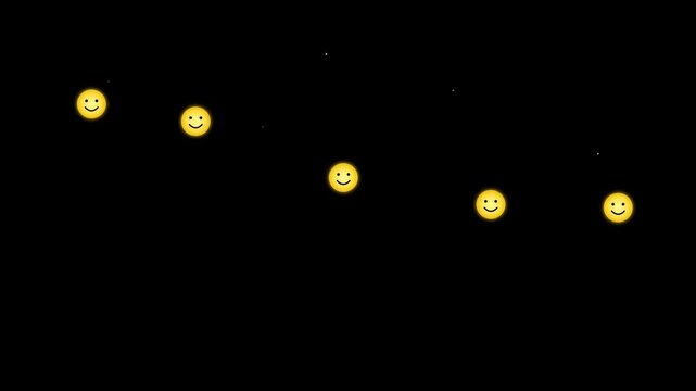 Glowing yellow smiley face icons moving across dark black background in digital animation motion video clip