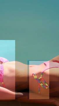 Relaxing by pool, woman in pink bikini with bar chart animation over