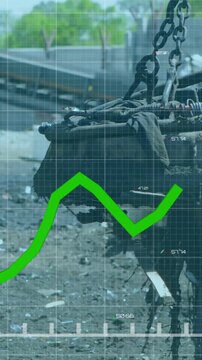 Green line graph animation over industrial machinery lifting scrap metal
