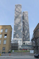 Fototapeta premium former LCBO headquarters/retail complex at 55 Lake Shore Blvd E and residential architecture (Sugar Wharf Condos, 100 Queens Quay E) west elevation, Toronto