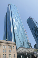 Fototapeta premium CIBC Square, global operational headquarters for the Canadian Imperial Bank of Commerce, designed by WilkinsonEyre, Adamson Associates, located at 81 and 141 Bay St, Toronto