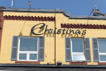 Fototapeta premium exterior building facade and sign of Christinas on the Danforth, a Greek restaurant, located at 492 Danforth Av, Toronto