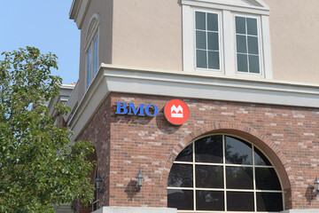 Fototapeta premium exterior building facade and sign of BMO Bank of Montreal at 147 Laird Dr, SmartCentres, East York, Toronto