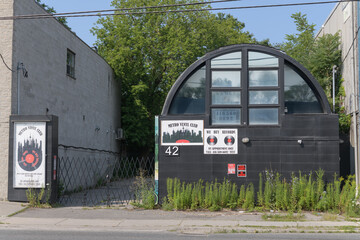 Fototapeta premium exterior building facade and signage at Metro Vinyl Club located at 42 Laird Dr, in Leaside, Toronto