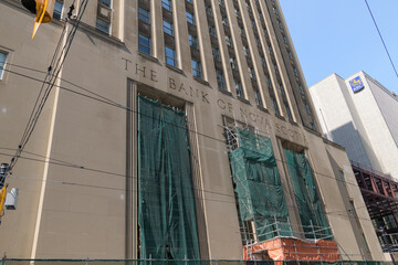 Fototapeta premium Bank of Nova Scotia Building, designed initially by John M Lyle, later Mathers & Haldenby, with Beck & Eadie, located at 44 King St W, northeast corner at Bay St, Toronto