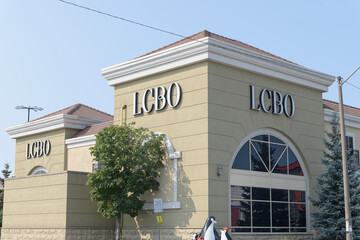 Fototapeta premium LCBO signage on the exterior of a location at 65 Wicksteed Av, SmartCentres, East York, Toronto
