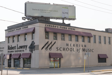 Fototapeta premium exterior building and signage outside Merriam School of Music located at 943 Eglinton Av E, East York, Toronto