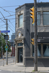 Fototapeta premium exterior building facade and sign of Lea-Ann Belter Bridal located at 238 Broadview Av, Toronto
