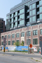 Fototapeta premium redevelopment of a heritage former auto-industry building (Durant/Dominion Motors) now V!VA Leaside, a retirement community at 150 Laird Dr (East York), Toronto