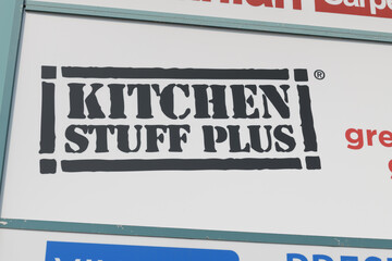 Fototapeta premium close-up of pylon sign, Kitchen Stuff Plus, a home goods store, located at 835 Eglinton Av E (East York), Toronto 