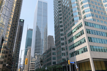 Fototapeta premium looking northeast on Bay St from foot of Front St W with view of Brookfield Place, TD Place and Commerce Court West and other buildings in the Financial District, Toronto