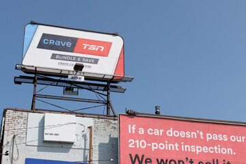 Fototapeta premium rooftop billboard with advertisement for Crave and TSN, Toronto
