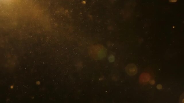 Microscopic view of glowing microorganisms in dark environment