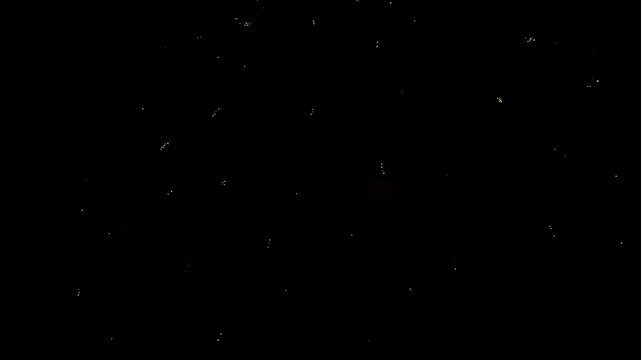 Firework burst in dark night sky with glowing trails and celebration festival sparkle