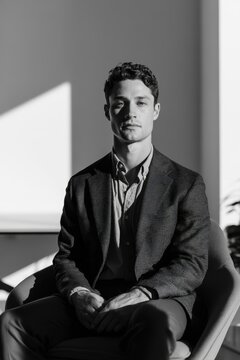 Portrait of a confident young businessperson in a modern office setting