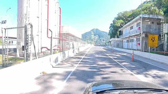 Car driving up the mountain on the Tamoios Highway, on the North Coast of S&atilde;o Paulo state.
