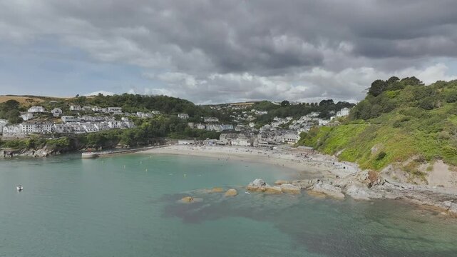 Beach and Cliffs over Looe Bay from a drone, Looe, River Looe, Cornwall, England