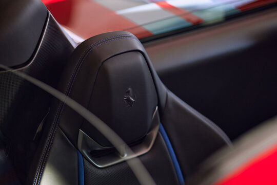 Ferrari 296 GTS, interior of a luxury cabriolet, highlighting precise stitching and elegant materials. A close-up reveals the stylish seat design. Katowice, Poland, 17.10.2022