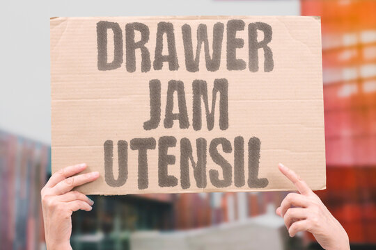 "Drawer jam utensil" A misplaced spoon keeps the kitchen drawer from closing fully. KITCHEN. DRAWER. JAM. UTENSIL. ORGANIZATION.