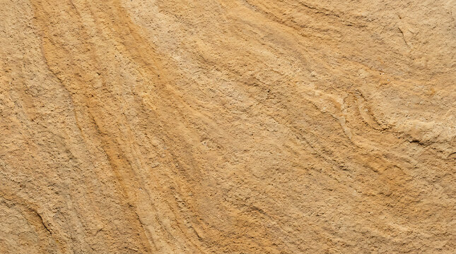 Close-up of textured sandstone surface showcasing natural striations and earthy tones with detailed granules