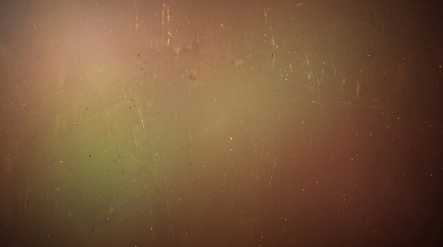 Warm sepia abstract background with floating dust particles, film grain and subtle scratches