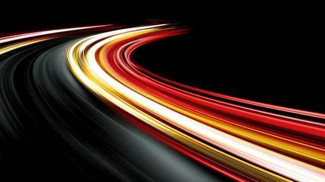 Abstract speed streaks of red yellow and white light trails on black background