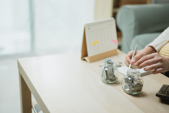 savings deposit planning with retirement goals; a savings jar and calendar arranged around future. savings guides buyer choices, deposit frames the scene, and planning adds useful meaning.