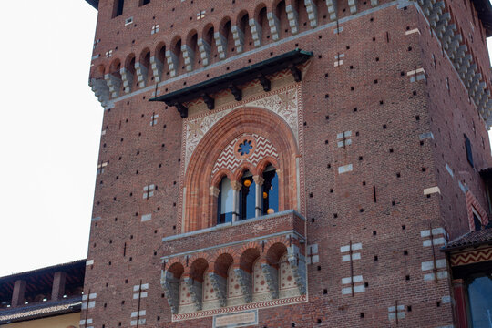 Ancient architecture wall Sforza Castle Brick Facade in Milan City Center Italy.