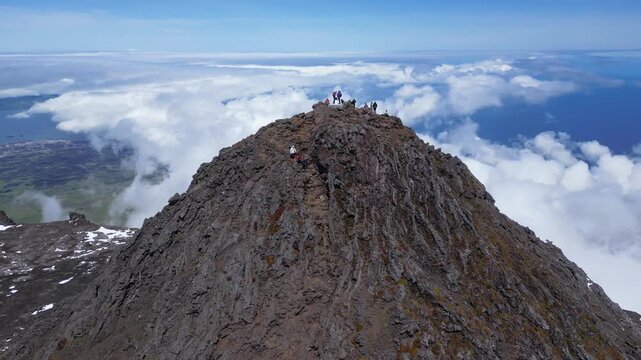 Drone View of People Standing on Pico Mountain, the Highest Peak in Portugal, on Pico Island in the Azores