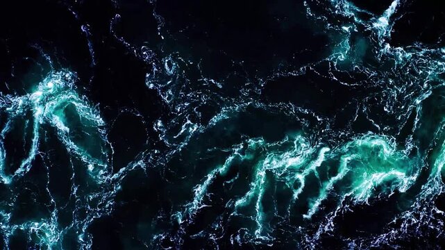 Ocean waves collide with river water forming a natural aquatic transition.