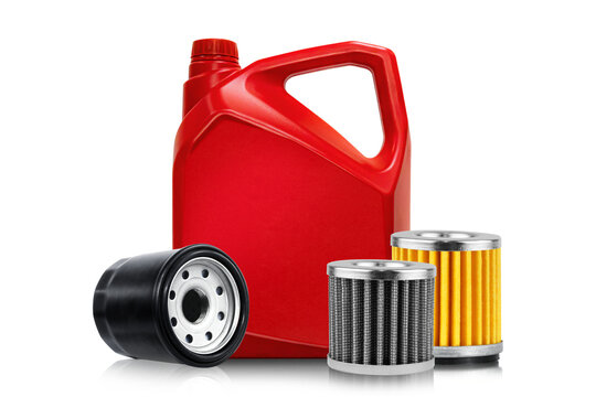 Automotive oil filters and motor oil containers red colour isolated on white background.
