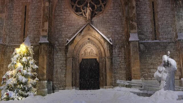 Night View of Sacred Heart Cathedral Exterior During Winter in Sarajevo, Bosnia and Herzegovina