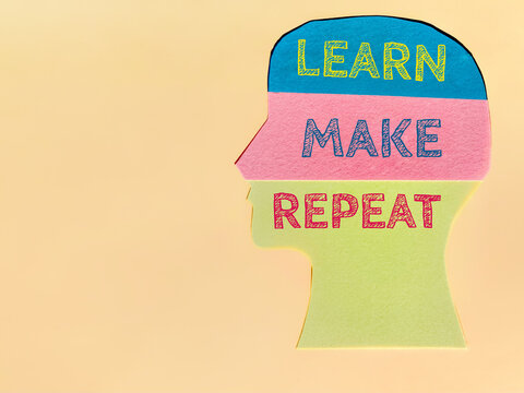 Conceptual human profile with Learn Make Repeat lettering, representing continuous learning, practice, creativity and personal development.