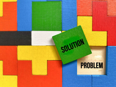 Problem and Solution Concept with Colorful Puzzle Blocks     illustrating problem solving, solutions, strategy and creative thinking.