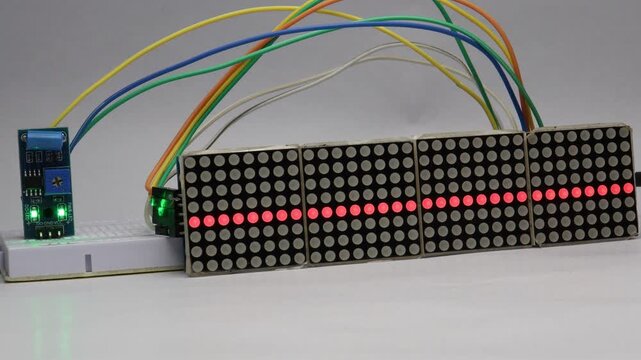 Vibration sensor module when tapped detects the signal and displays it as dots on a red dot matrix screen